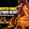 Fermented foods linked to Heart health beside glowing digestive anatomy