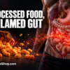 Ultra-processed foods spilling from a bag toward an inflamed human gut
