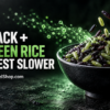 Black and green rice grains piled high in a black bowl