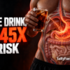 Man holding a sugary drink with a highlighted stomach showing cancer risk
