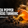Turmeric root, black peppercorns, and ginger displayed together
