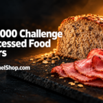 Slices of cured deli ham beside a seeded wholegrain loaf illustrating ultra-processed food cancer